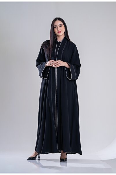 Al Afnan Boutique An elegant abaya made of crepe fabric with a touch of silve...