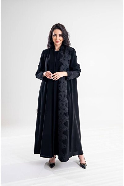 Al Afnan Boutique A distinctive and elegant abaya made of ceramic Crepe fabri...