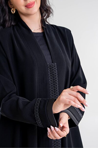 Al Afnan Boutique A luxurious abaya made of Cobra Crepe fabric with buttons d...