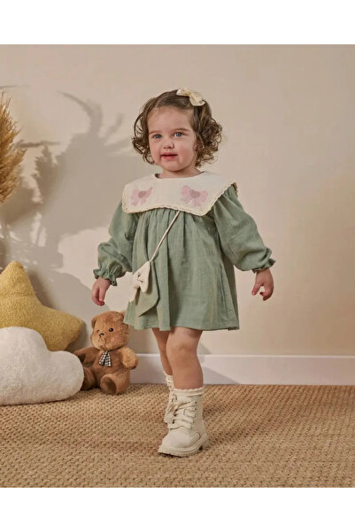 Minipodyum Nakış Detaylı Bebe Yaka Çantalı Bayramlık Keten Kız Bebek Elbise