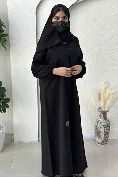 Hasnaa Abaya Abaya with an elegant collar, gathered sleeves, and black embroi...