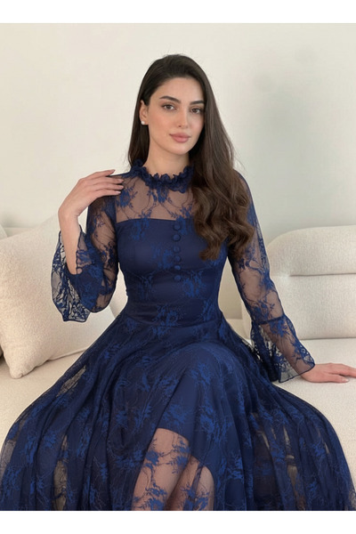 DVNA Elena's dress is made of luxurious burgundy Lace .