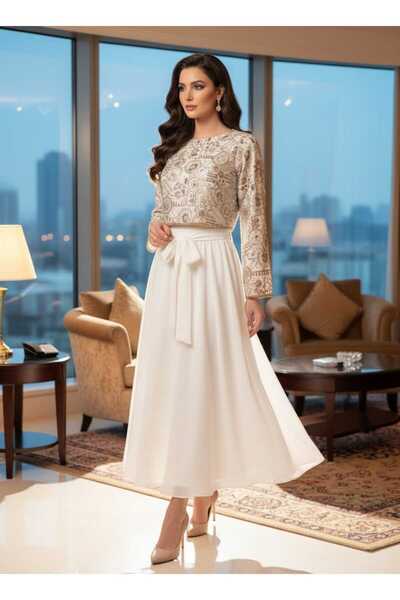 Elegance and beauty An elegant two-piece dress consisting of a short embroide...