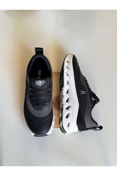 on Clouds On Cloudtilt x Loewe 2.0 in black,