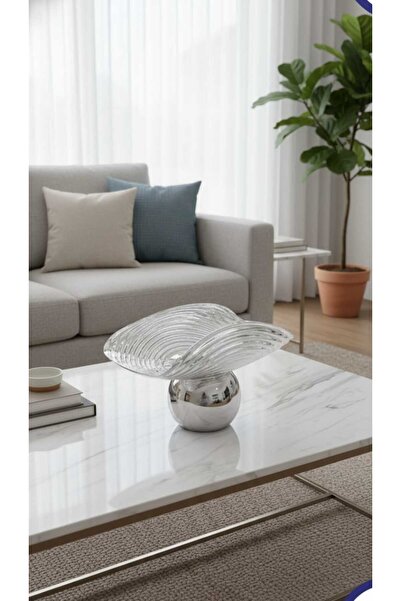 Generic A set of dessert and fruit serving dishes with a luxurious decorative...