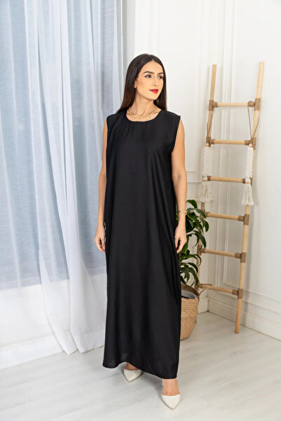 outline black underdress under abaya