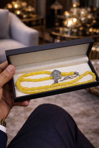 Generic A luxurious and elegant yellow rosary with a stylish box – a sophisti...