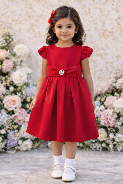 La reina petite Red dress with a bow-shaped belt