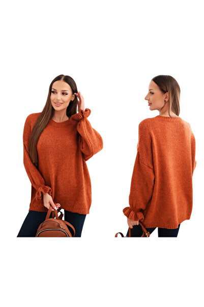 Kesi Un pulover de damă de culoarea ghimbirului, cu o notă de mohair și lână,...