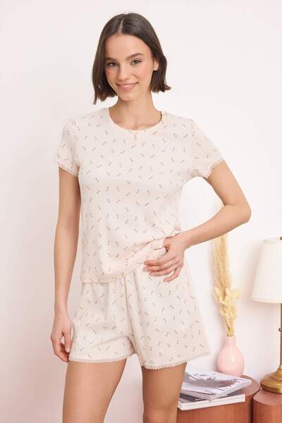 Trendyol Collection Svetlo roze pamučna pidžama sa cvetnim čipkastim detaljim...