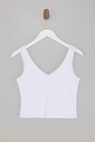 Trendyol Curve قميص داخلي محبوك مرن بياقة على شكل حرف V باللون الأسود قماش مج...