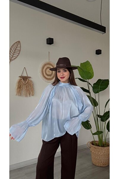 modadagiyim بلوزة نسائية زرقاء مزينة بكشكشة وتفاصيل أكمام مكشكشة وربطة خلفية ...