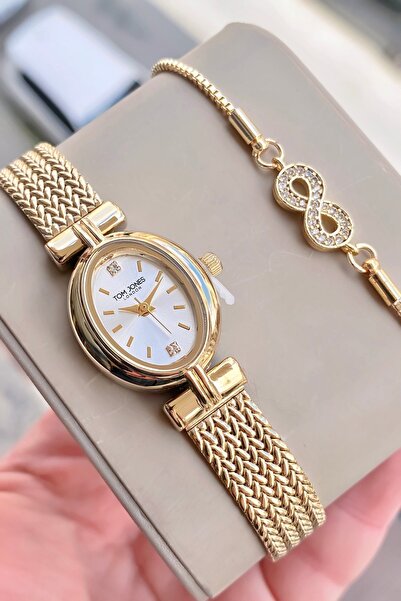 Tom Jones Kadın kolsaati gold orjinal çelik 3 atm su gecirmez 2 yıl garantili...