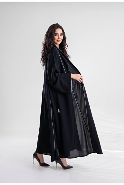 Al Afnan Boutique A distinctive, soft abaya made of crepe fabric with an eleg...