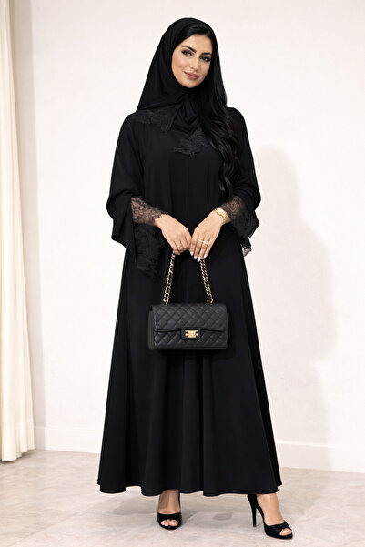 NN01 An abaya made of crepe fabric, decorated with lace on the sleeves and th...