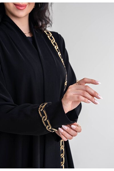 Al Afnan Boutique A distinctive and elegant abaya made of ceramic Crepe fabri...
