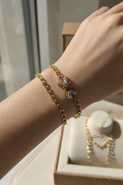 M2 group Women's gold watch set with a collection of elegant, gem-studded bra...