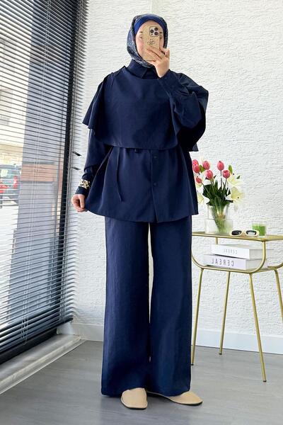 MELEK ARAZ Costum dublu cu parașută și nasturi laterali, cu detalii tip peler...