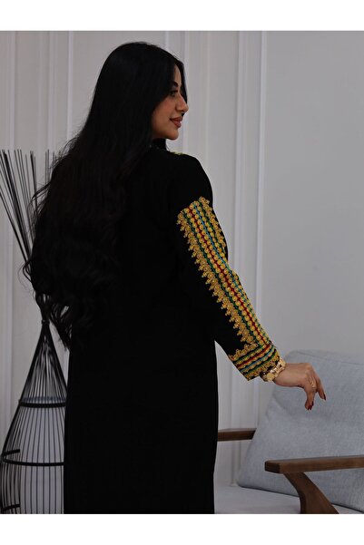 BS A traditional jalabiya with a design inspired by authentic Arab identity, ...