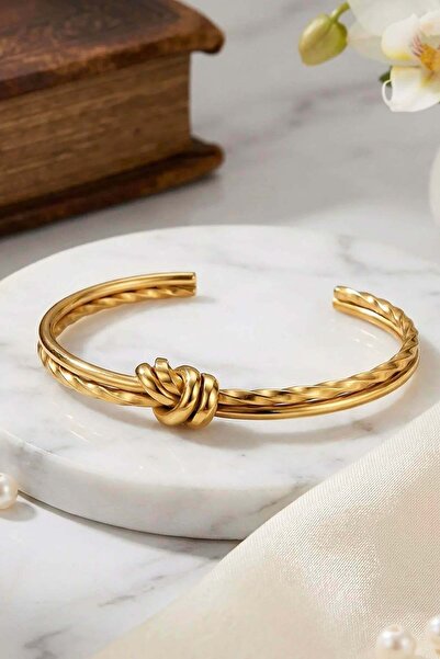 TAKIŞTIR مشبك/سوار ذهبي اللون بتفاصيل عقدة