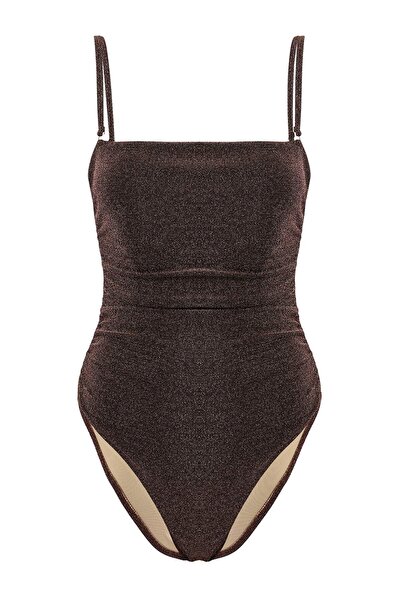 ترينديول كوليكشن براون لمّاع بدون حمالات مايوه برازيلي عالي الساق بتصميم دراب...