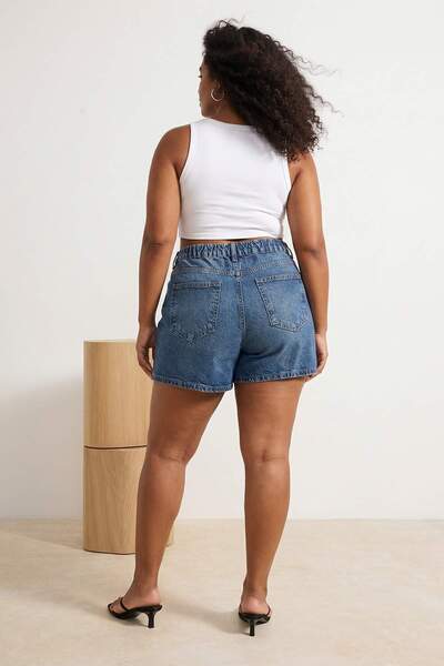 Trendyol Curve Blaue, elastische, hochtaillierte Mini-Jeansshorts aus 100 % B...