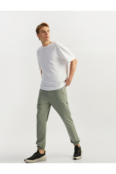 Koton Fermuarlı Cep Detaylı Beli Lastikli Paraşüt Kumaş Jogger Spor Eşofman Altı