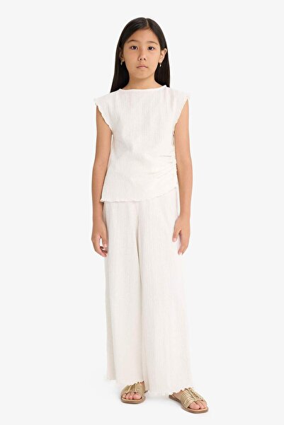 DeFacto Dvodelni set Broderija bez rukava, široka bluza i pantalone za devojč...