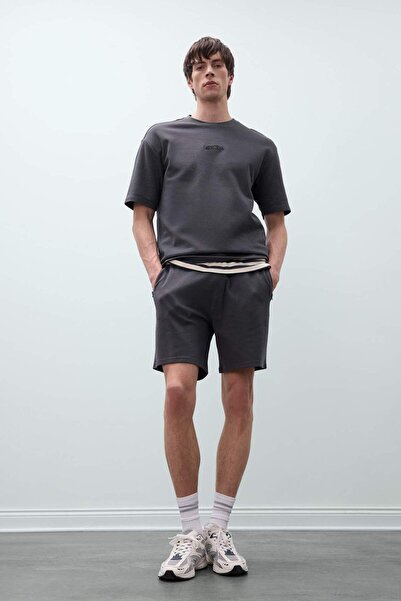 DeFacto Basic-Dusch-Shorts mit gerader Passform und Taschen B8792AX25SM