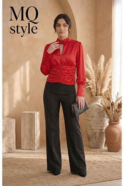 MQ A blouse with a design that combines modern luxury and overwhelming femini...