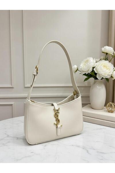 Genera A stylish women's Clutch Bag that can be carried by hand or over the s...