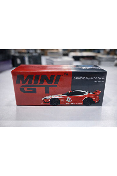 mini gt إل بي ★ سيارة تويوتا جي آر سوبرا باللونين الأحمر والأبيض