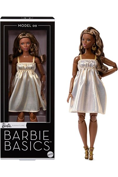 Barbie Păpușă de colecție Basics Model 09 cu păr brunet, rochie aurie și sand...