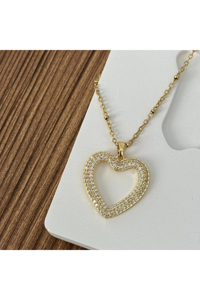 TURKAFONE قلادة على شكل قلب ذهبي عريض مرصّع بالأحجار