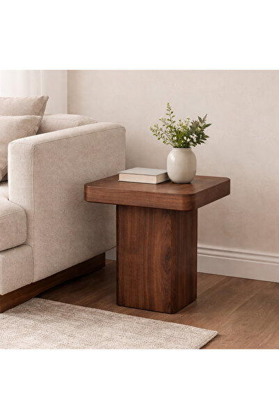 Vi Markets A modern wooden side table with a sturdy pedestal base, designed t...