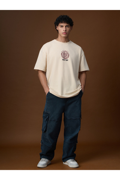 The Souled Store By Styli تيشيرت كريمي اللون برسومات نايت فيوري، مقاس كبير