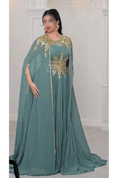 domiga Luxurious emerald-colored kaftan with royal gold embroidery and a Plea...