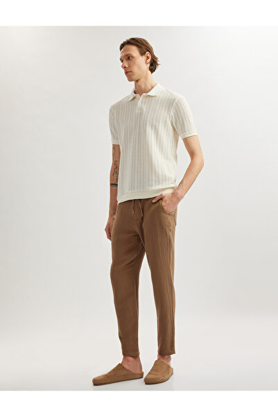 Koton بنطال تشينو من القطن الموسلين برباط وخصر بتفاصيل جيب