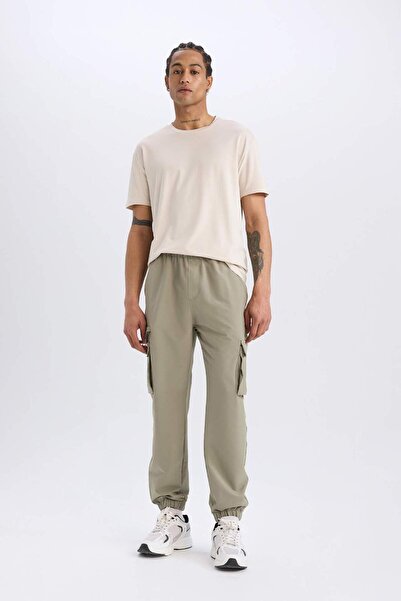 DeFacto Sporcu Jogger Eşofman Altı Slim Fit Dar Kesim Dokuma Kargo Cepli Stan...