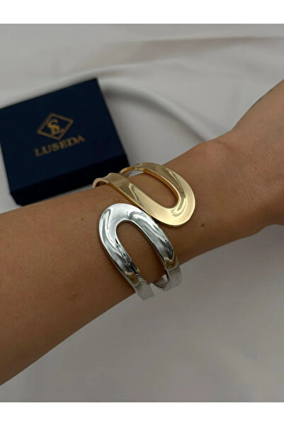 Luseda سوار معصم بتصميم بيضاوي وتفاصيل مميزة من نوع فلو فورم