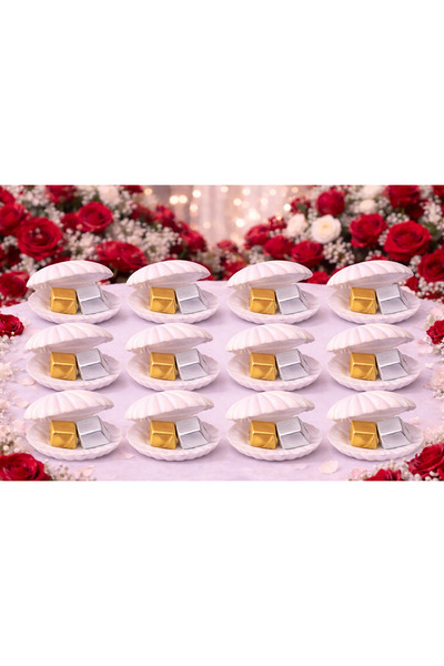 Saudia شوكولاتة بلجيكية فاخرة داخل علب توزيعات على شكل صدفة لؤلؤية أنيقة عدد 12