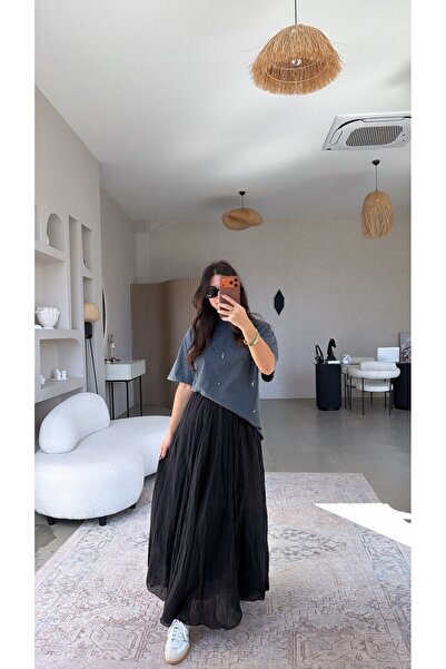 Buket Teke تنورة سوداء مطوية بالكامل من قماش التينسل منسوج