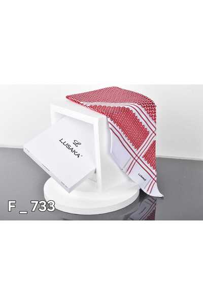 Genrics A shemagh from the Lusaka brand, featuring a traditional red and whit...