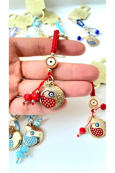 Cassime Κόκκινο μπρελόκ με μοτίβο χρυσού επιχρυσωμένου διακοσμητικού στοιχείο...