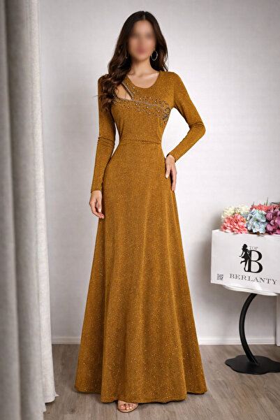 TOP BERLANTY A "sparkly evening" dress with a modern design and warm colors.