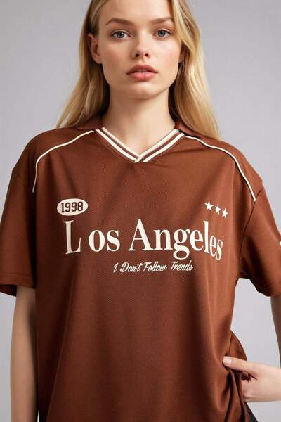 DeFacto Tricou cu mânecă scurtă, cu guler polo, supradimensionat cu imprimeu ...