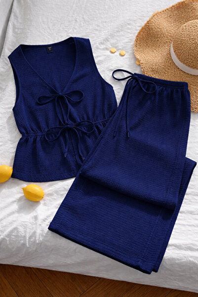 WEEST MODA lacivert yelek ikiönden bağlama detaklı geniş paça pantolon alt üs...