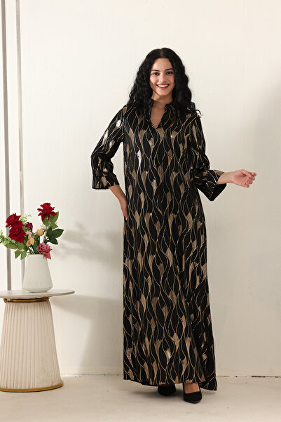 TOP BERLANTY A luxurious black jalabiya with a gold pattern – everyday elegan...