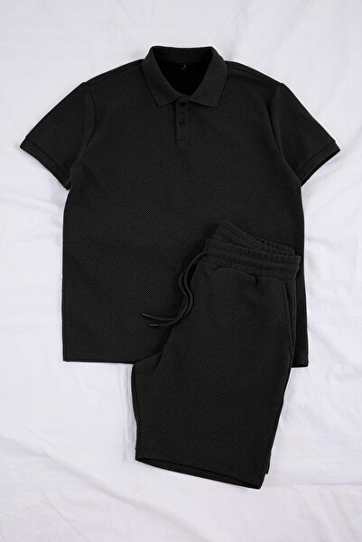 ترينديول كوليكشن طقم بدلة رياضية بياقة بولو وقصة عادية باللون الأسود TMNSS26E...