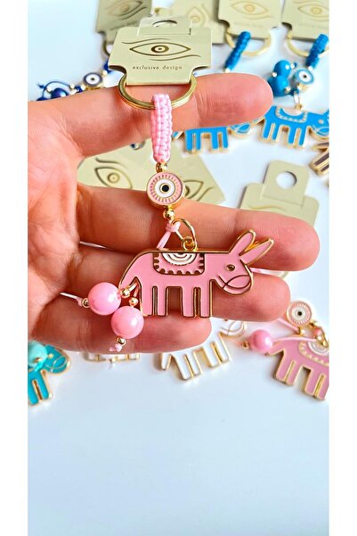 Cassime Επιχρυσωμένο μπρελόκ με σχέδιο ροζ γαϊδούρας και μάτι του διαβόλου